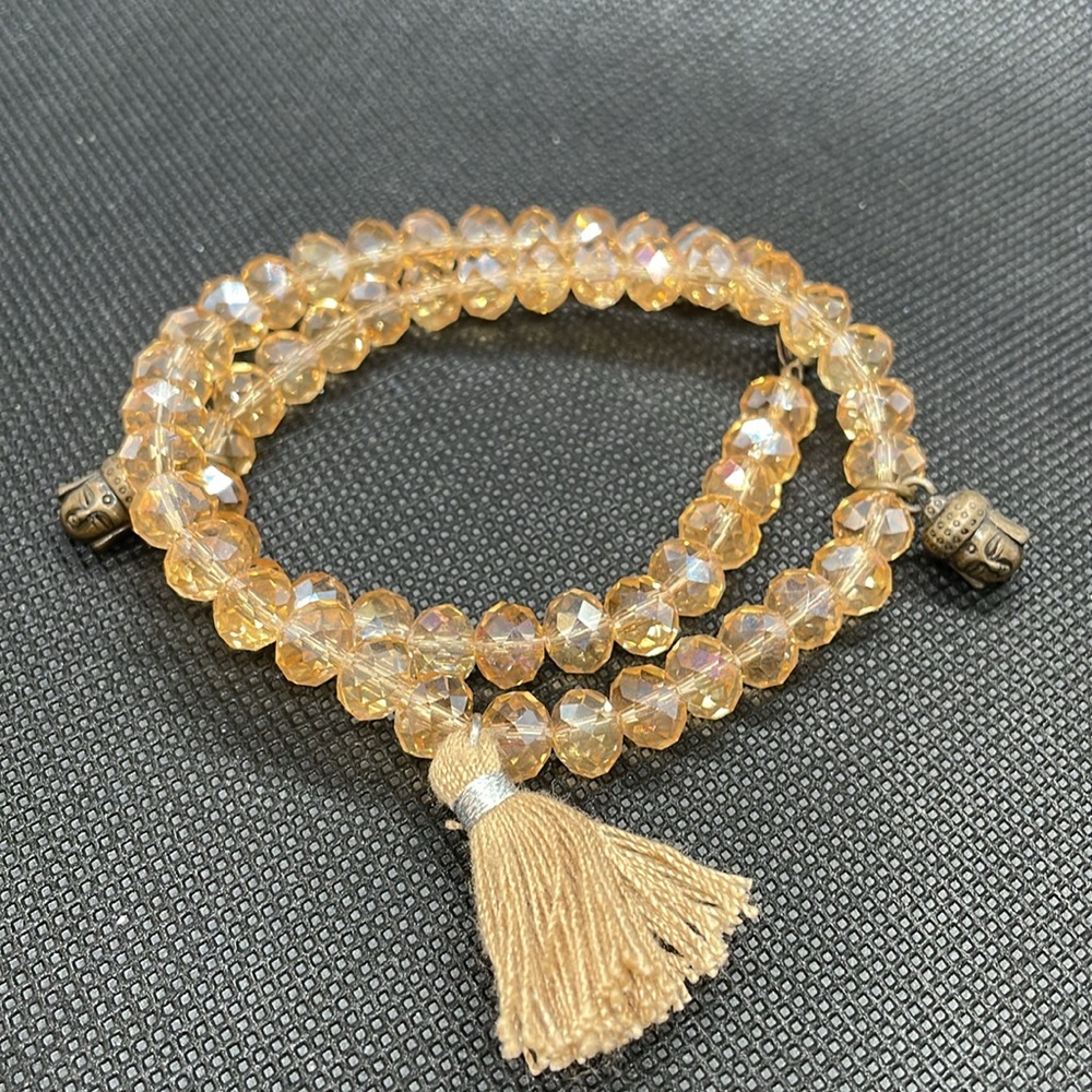 Double strand gold beaded Buddha bracelet